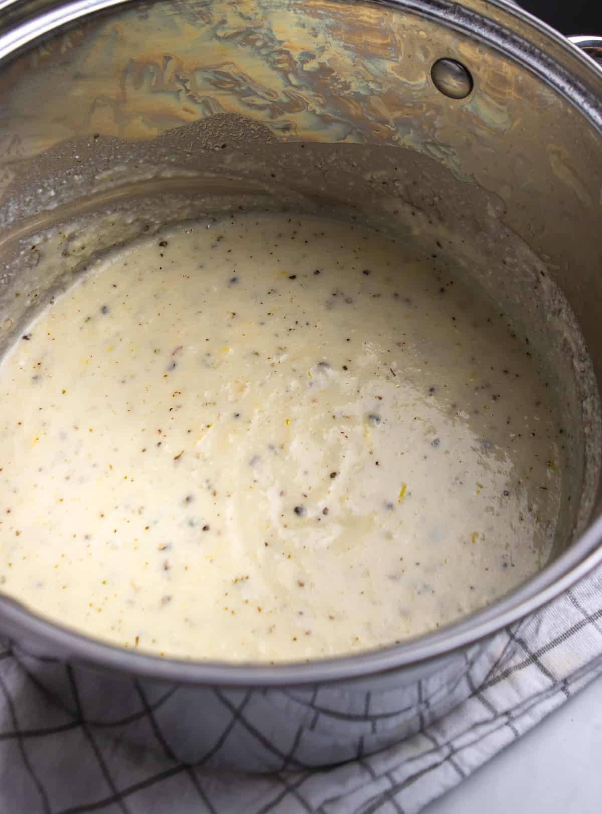 Lemon Ricotta sauce in pot.