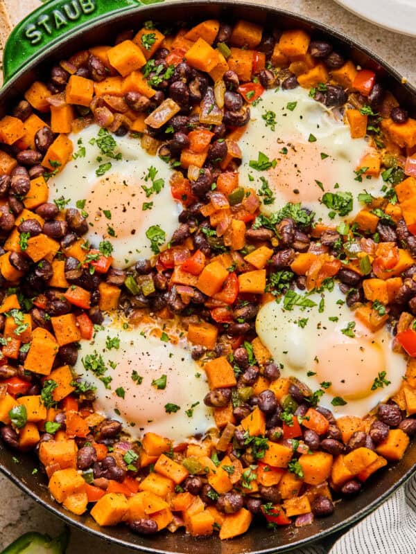 Sweet potato breakfast hash with black beans in skillet.