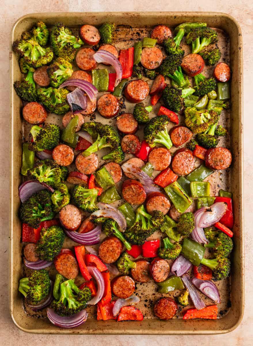 Cooked sausage and vegetable sheet pan dinner.