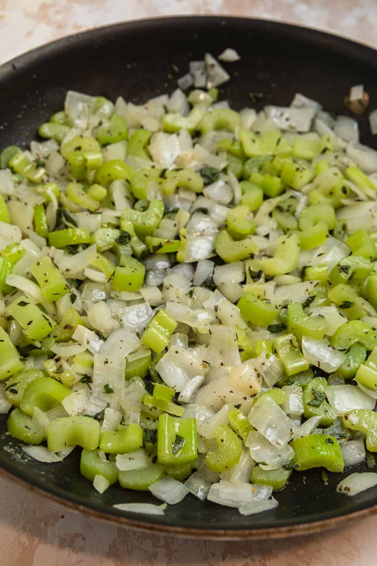 Sautéed celery and onion in skillet.