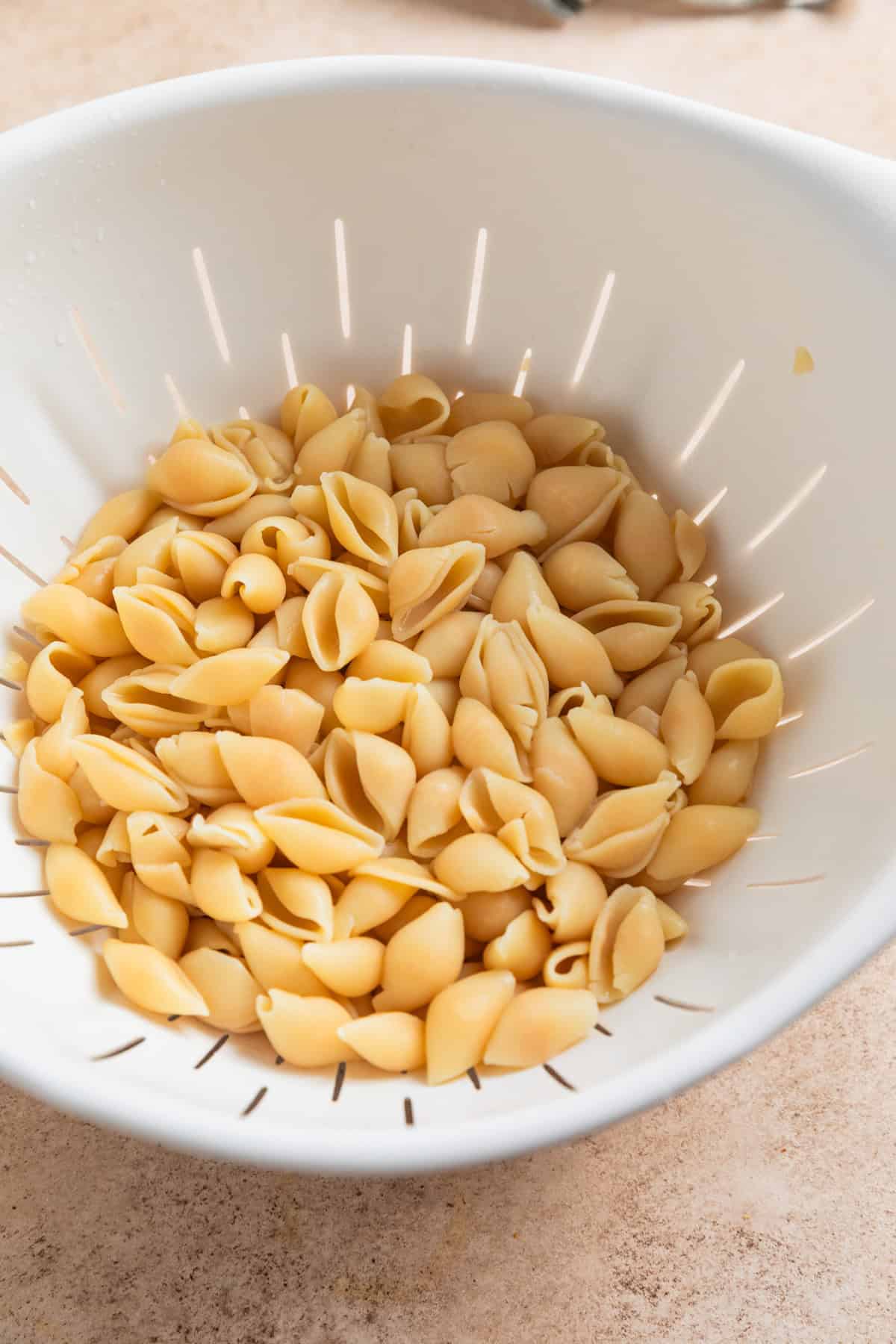Protein pasta in colander after being cooked al dente.