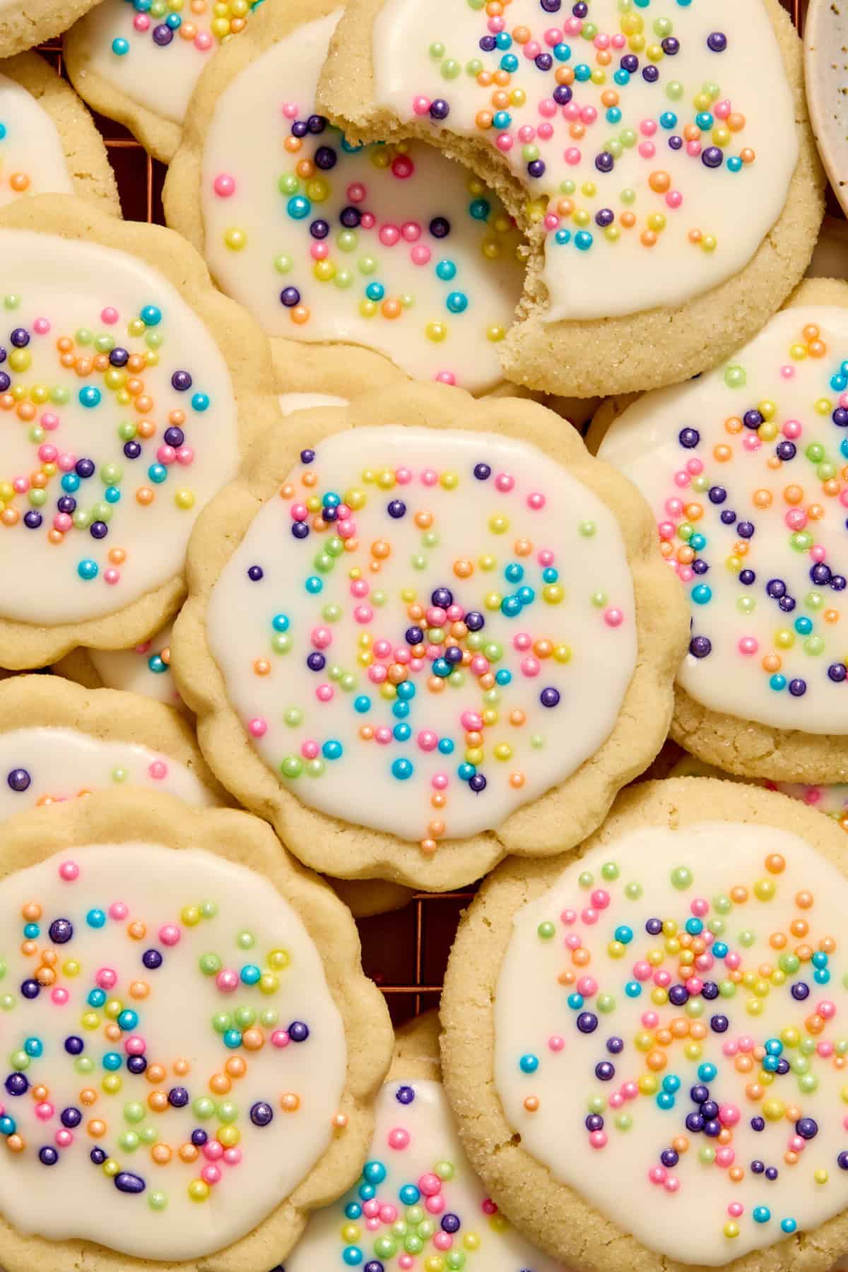 Eggless sugar cookies arranged together with cut outs and drop cookie variations.