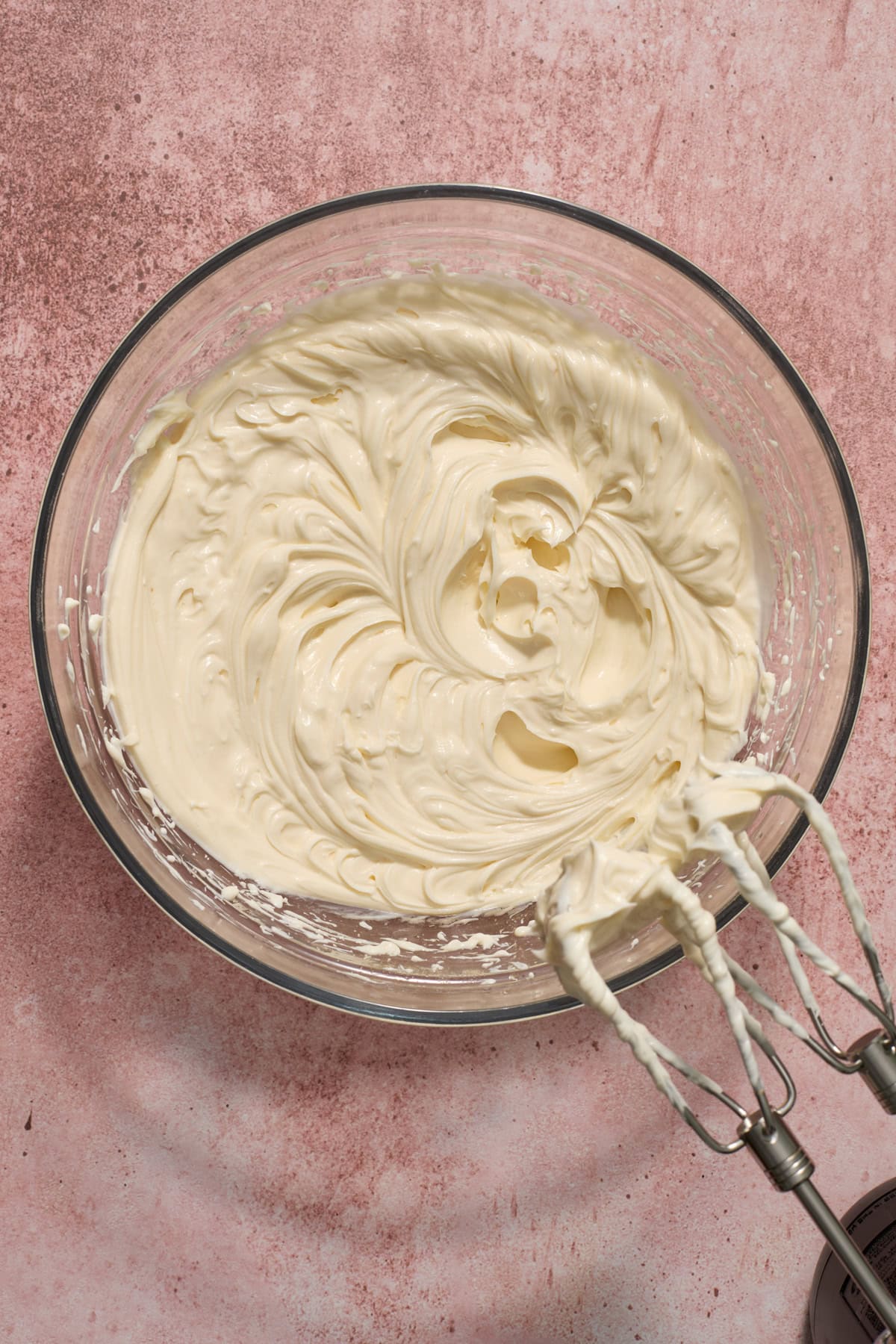 No bake cheesecake mixture in glass bowl.