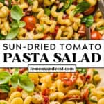 Salad bowl with sun dried tomato pasta salad topped with chopped basil and parmesan cheese, with utensils scooping into the bowl.