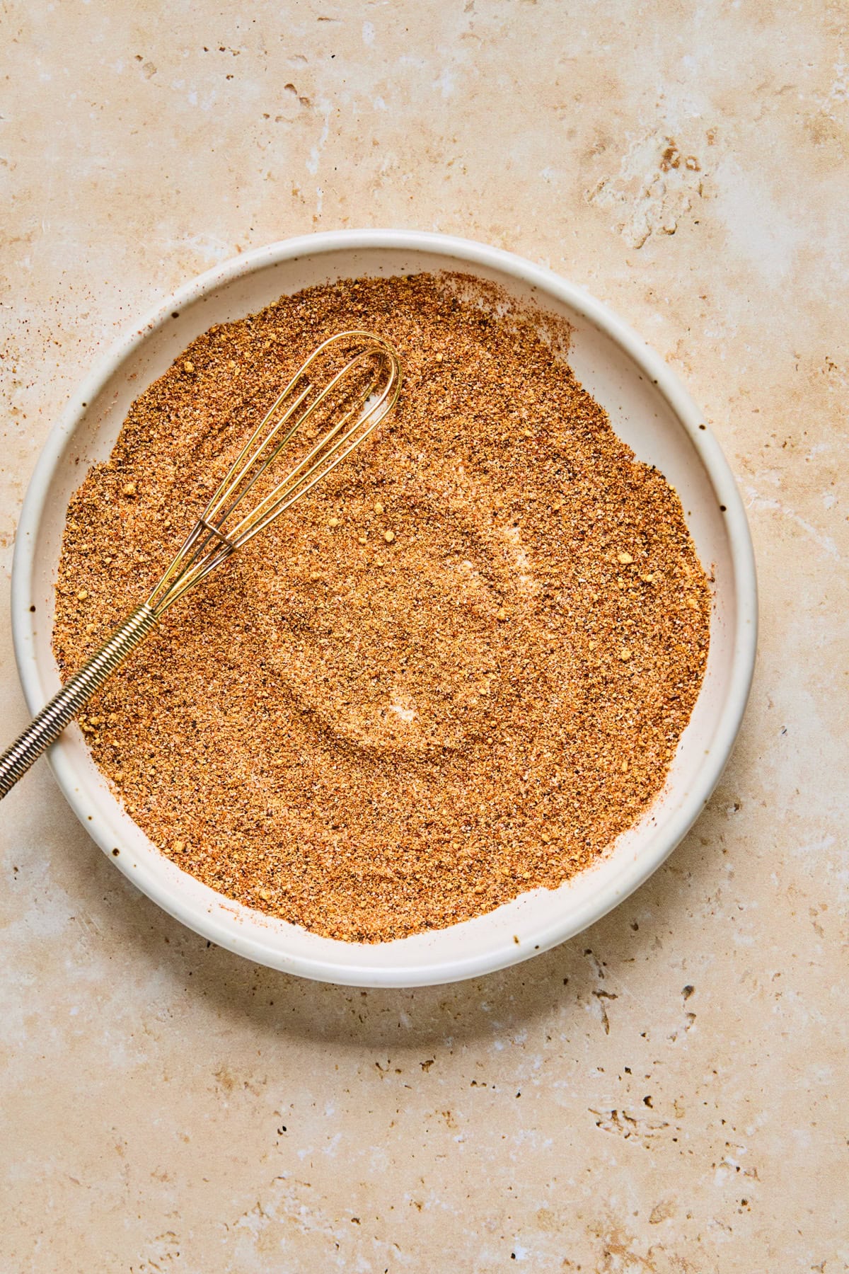 Spices whisked together for grilled chicken drumsticks rub.