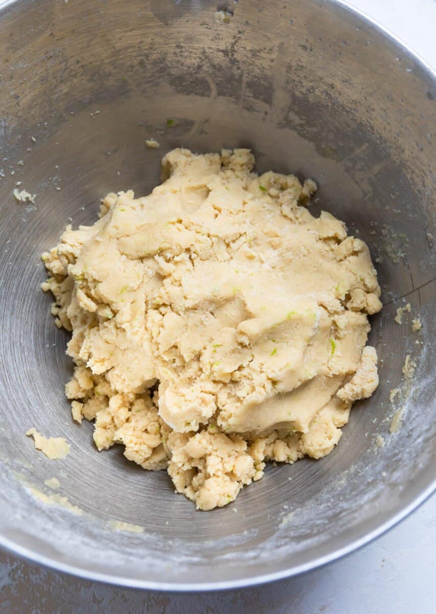 Key lime cookie dough prepared in mixing bowl.