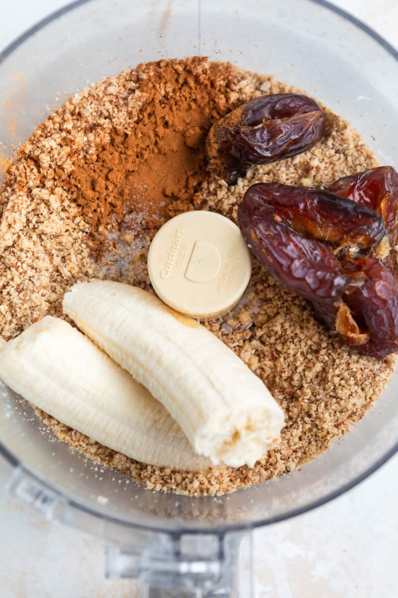 Banana, medjool dates, cinnamon, and vanilla added to mixture in food processor.