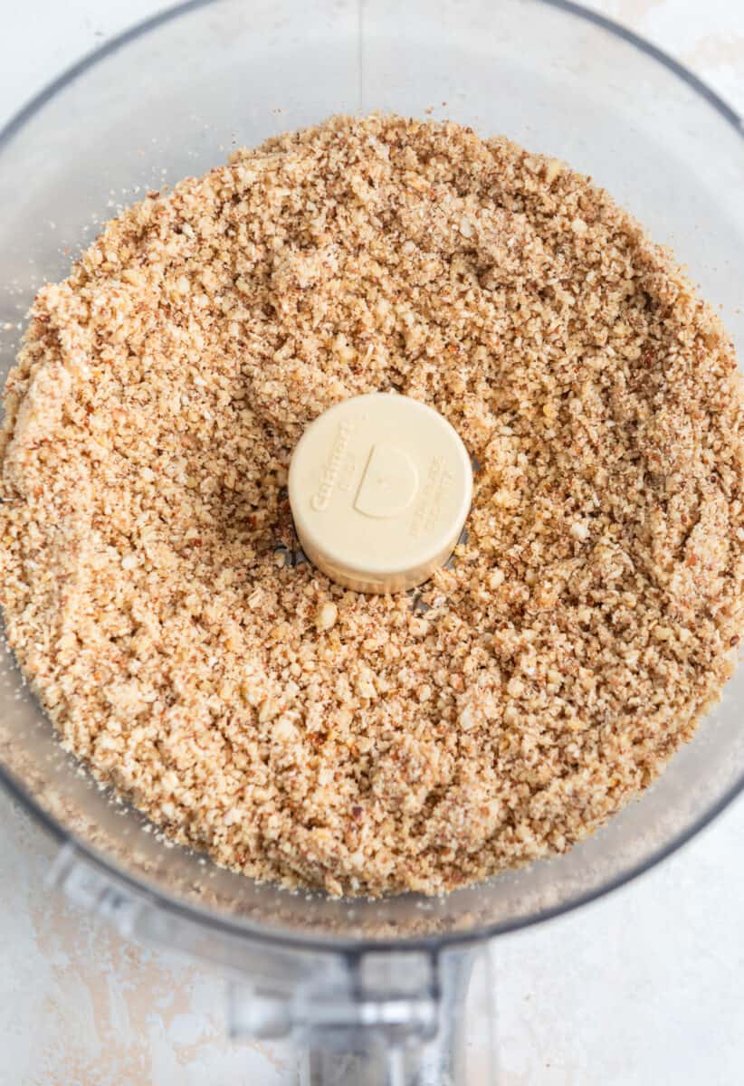 Ground almonds, oats and walnuts in food processor.
