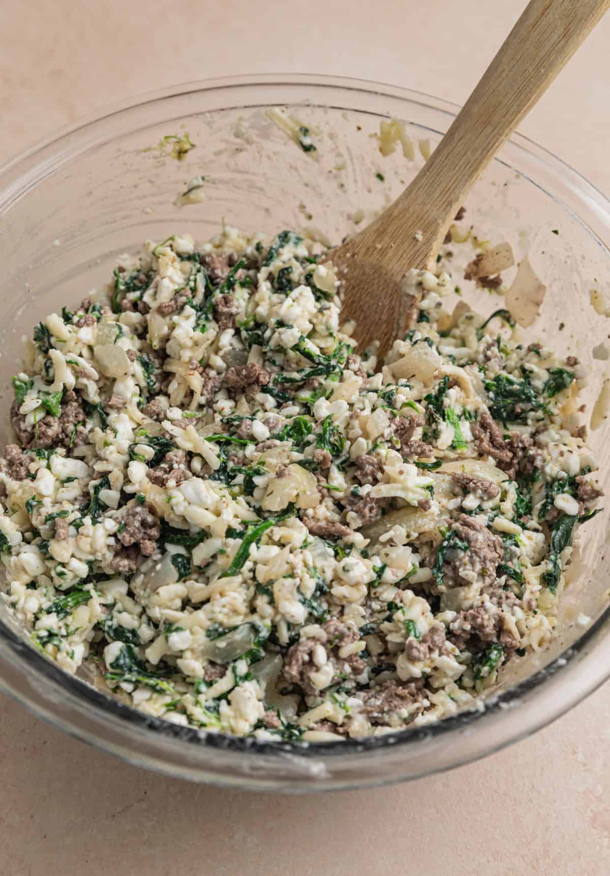 Ground beef added to stuffed shells mixture.