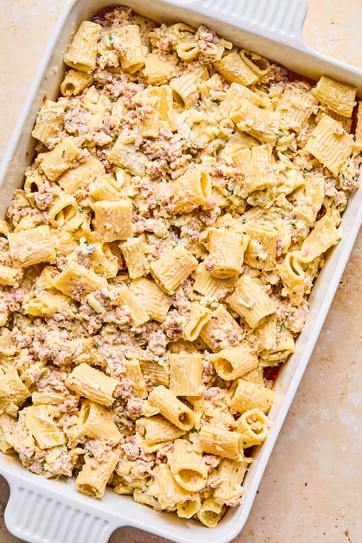 Pasta mixture added over top of marinara sauce.