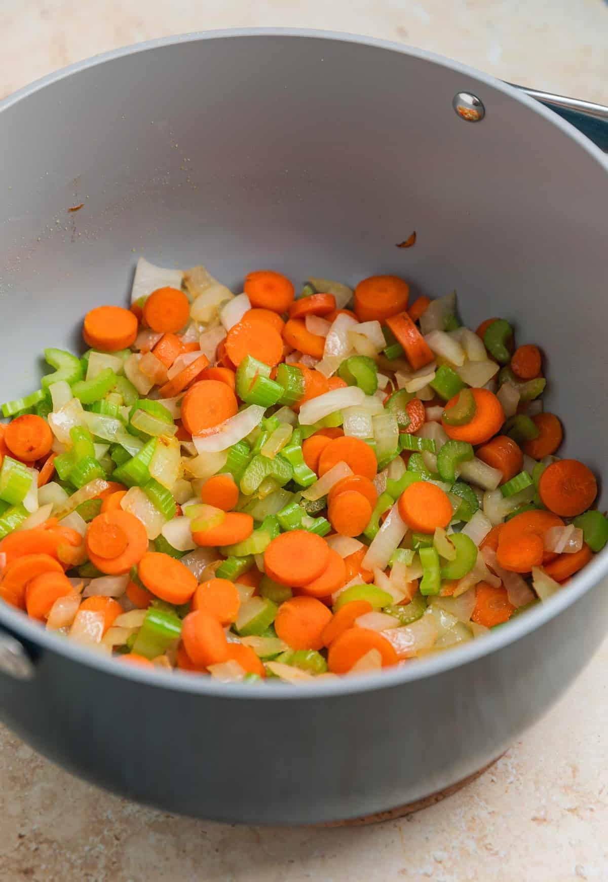 Sauteéd carrots, onion and celery in stock pot.