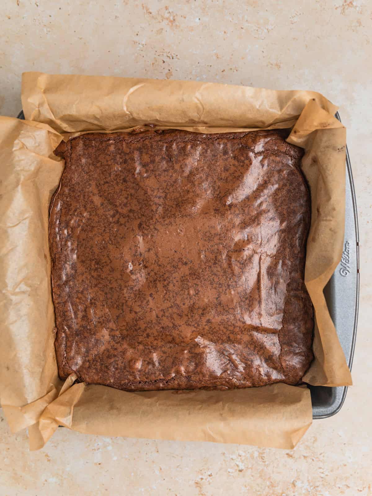 Freshly baked brownies in pan.