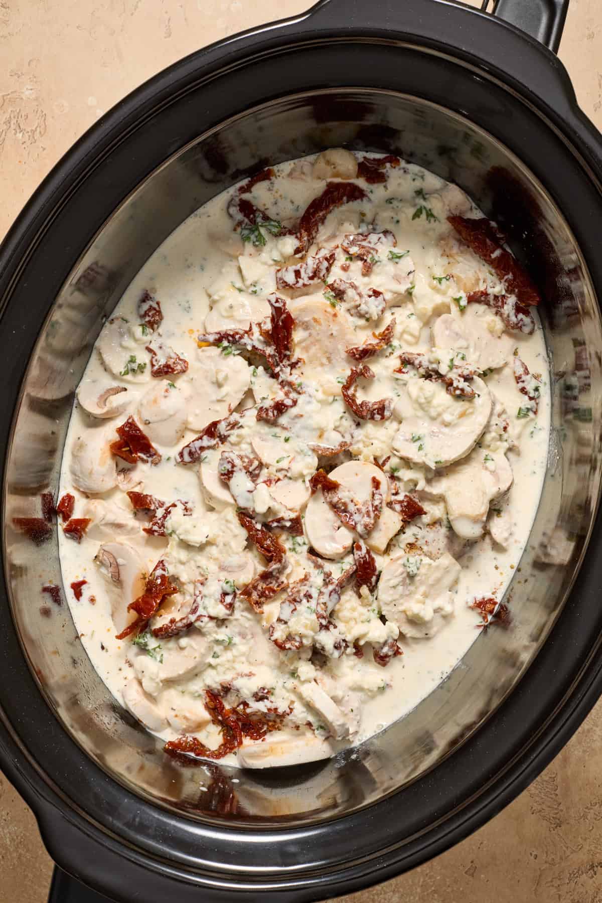 Seasoned chicken breast topped with mushrooms and sun-dried tomatoes and cream mixture.