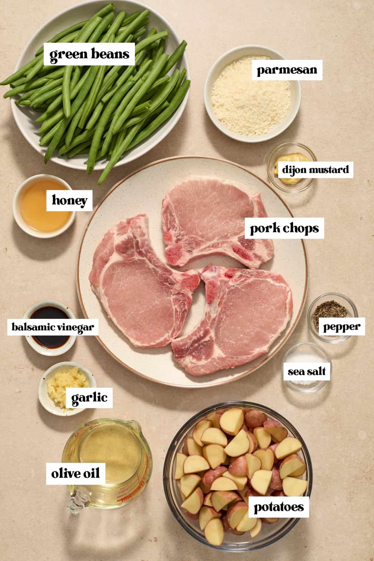 Pork chops, green beans, parmesan, dijon mustard and other labeled ingredients.