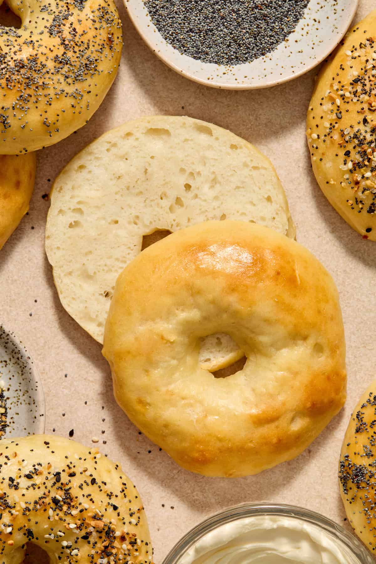 Greek yogurt protein bagel sliced in half to show the texture inside.