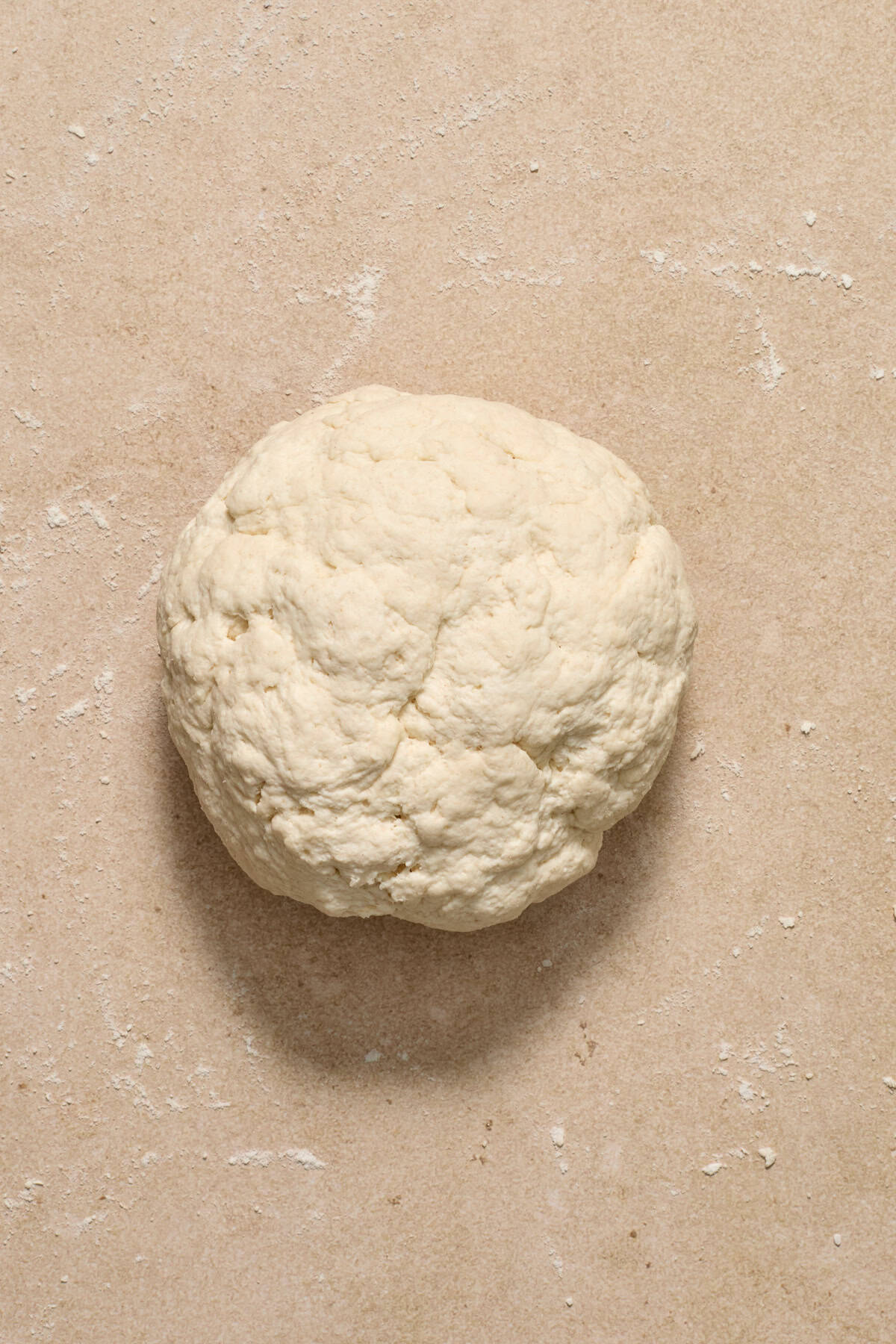 Ball of dough on surface. 