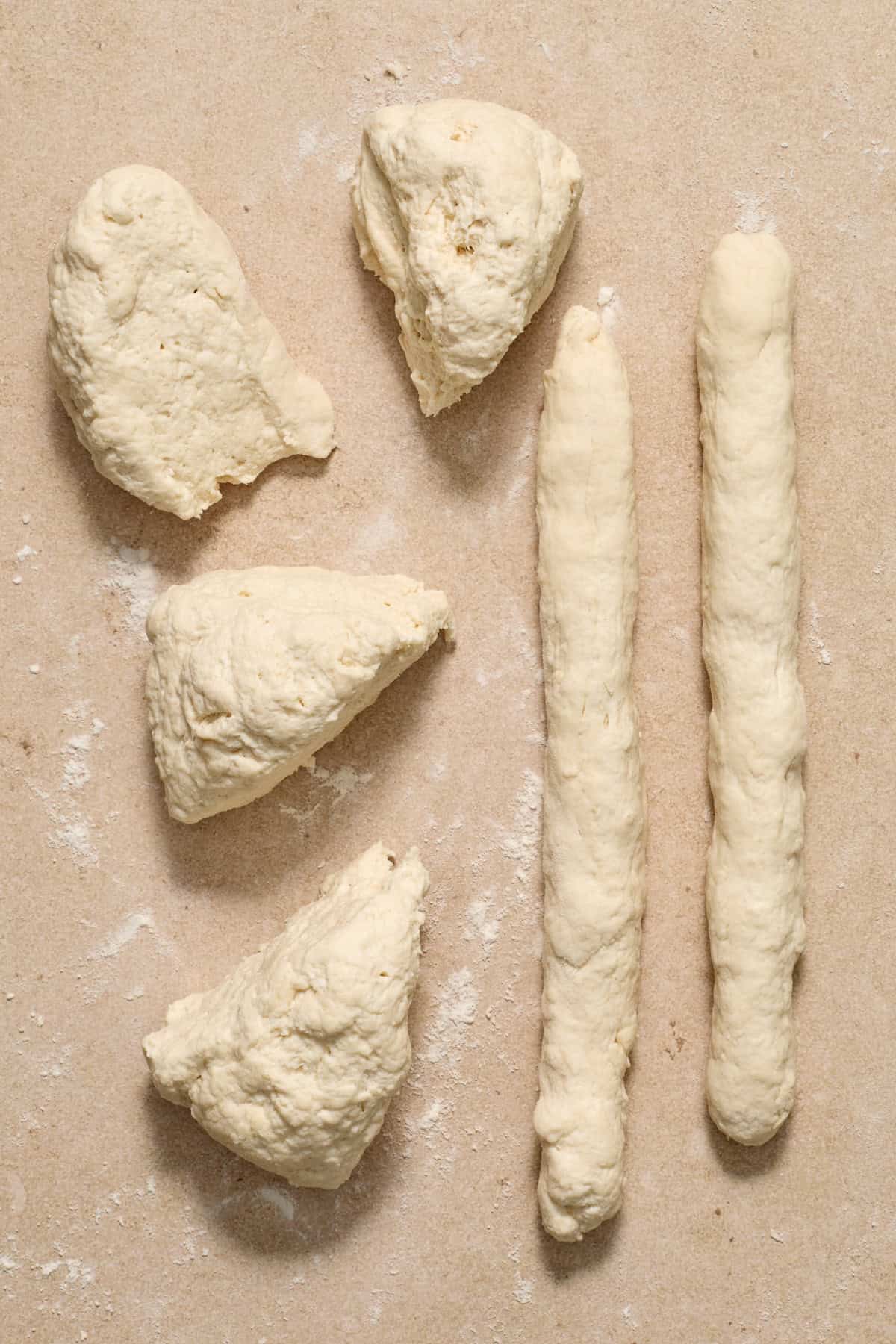 Rolled out dough on floured surface.