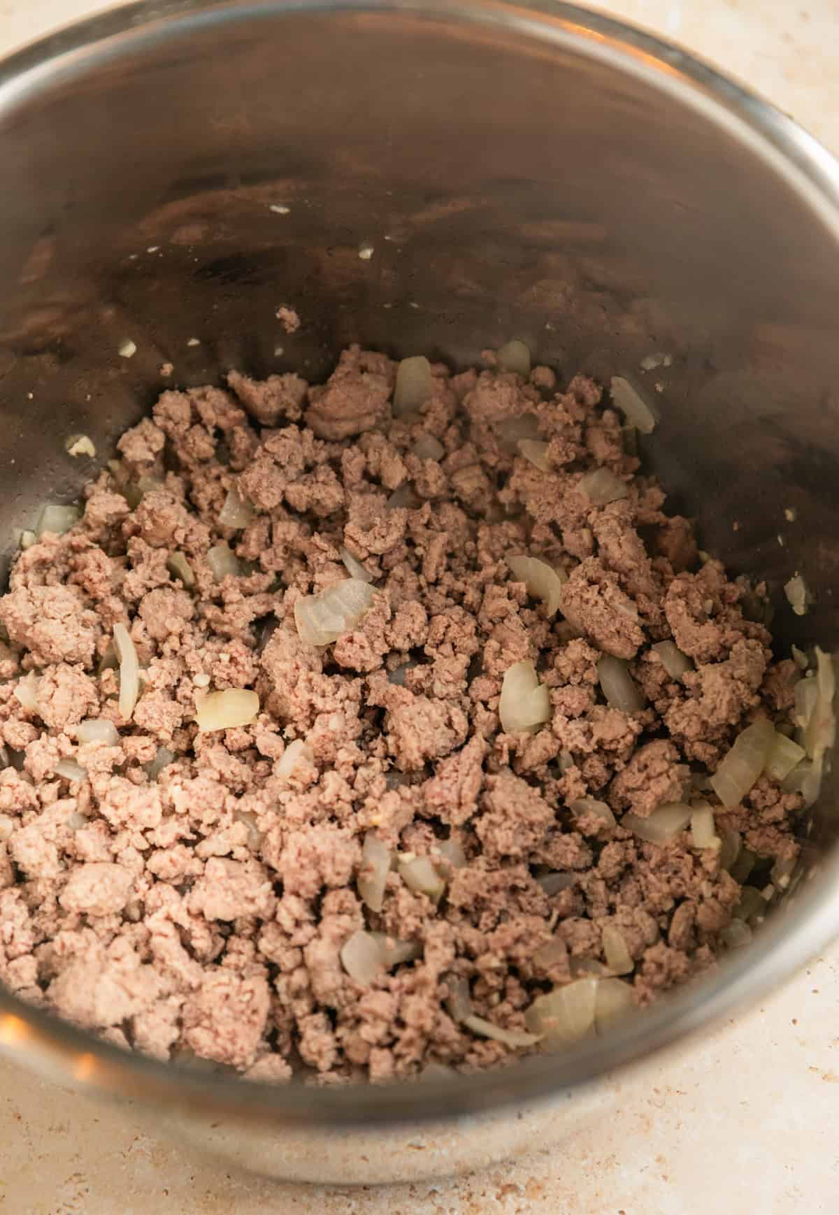 Italian sausage browned in Instant pot pressure cooker.