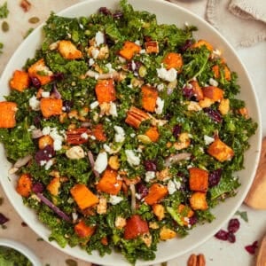 Roasted sweet potatoes and kale salad with cranberries, pecans, toasted pepitas and other ingredients.