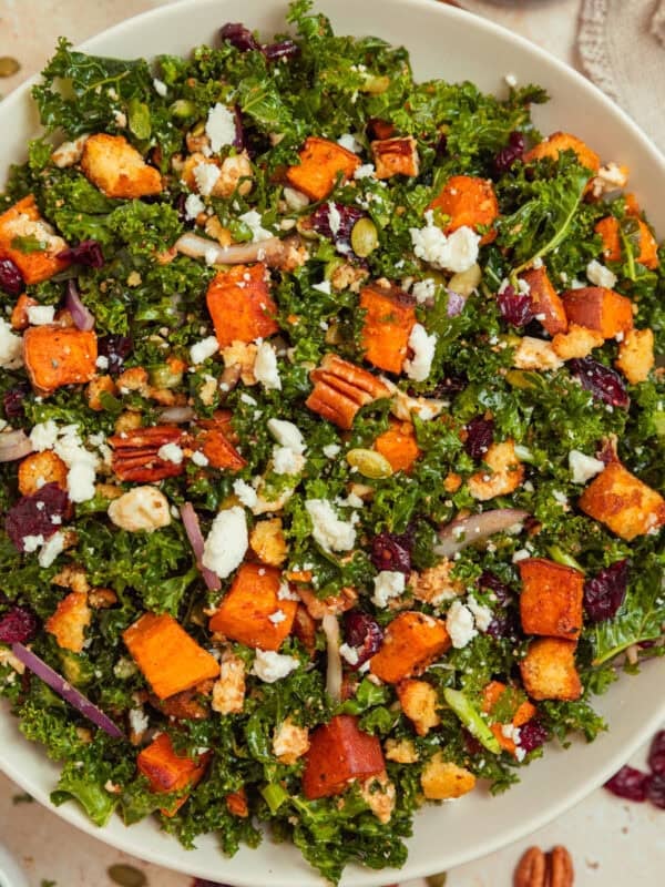 Roasted sweet potatoes and kale salad with cranberries, pecans, toasted pepitas and other ingredients.