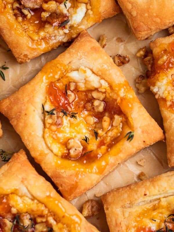 Puff pastry squares with goat cheese and apricot jam.
