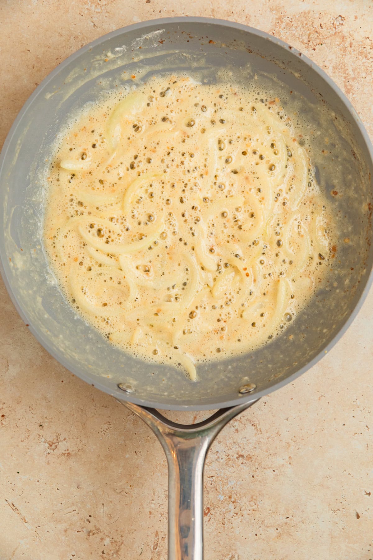Roux prepped in skillet with onions.