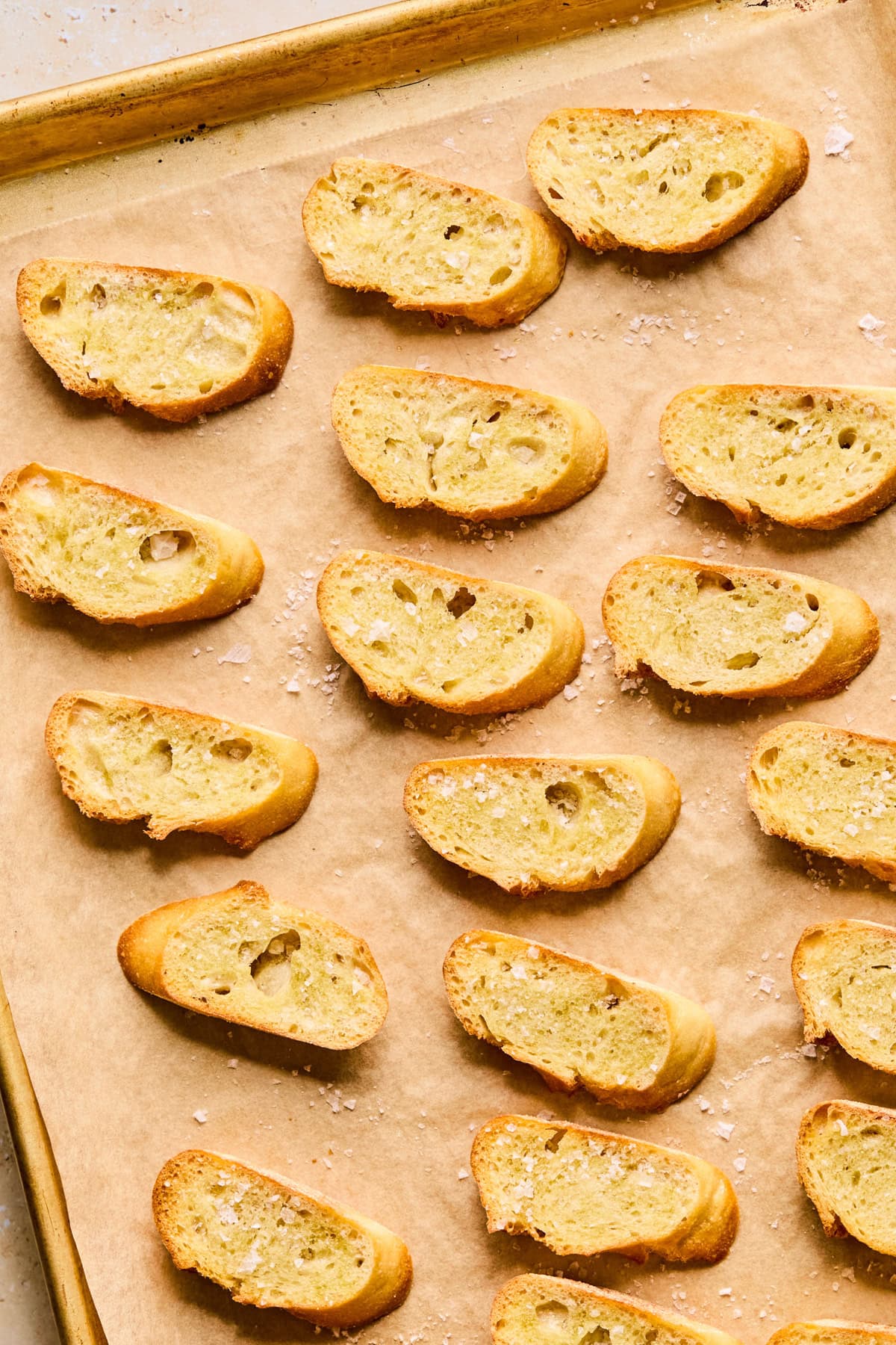 Toasted crostini with sea salt on top.