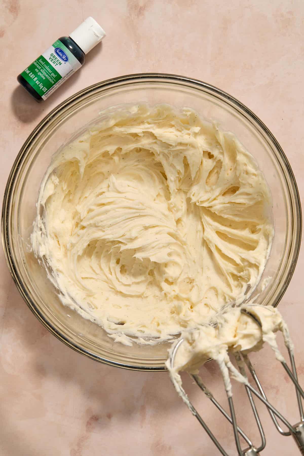 Buttercream frosting whipped in bowl.