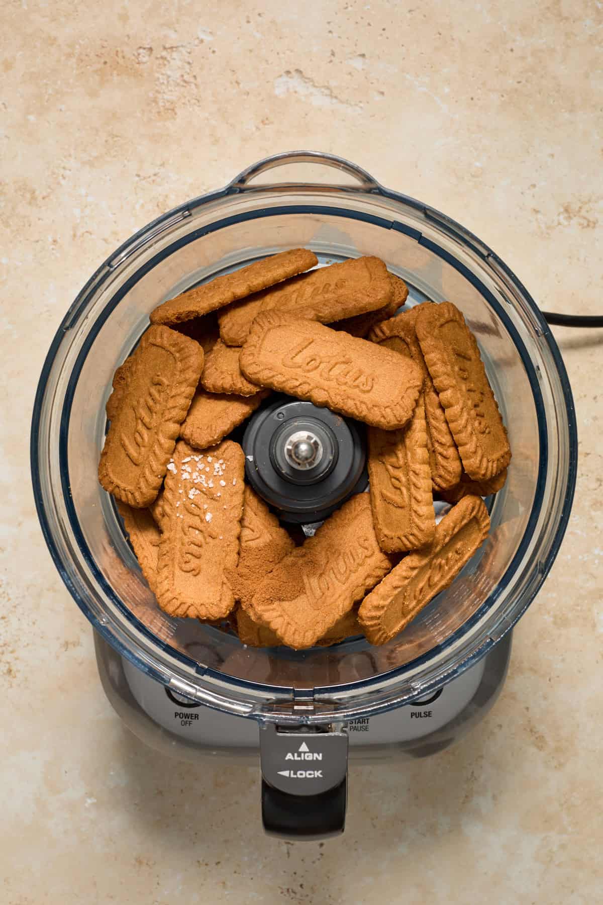 Lotus cookies in food processor with sea salt.