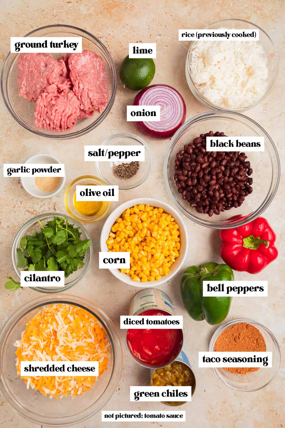 Shredded cheese, bell peppers, meat, corn, black beans, and other labeled ingredients.