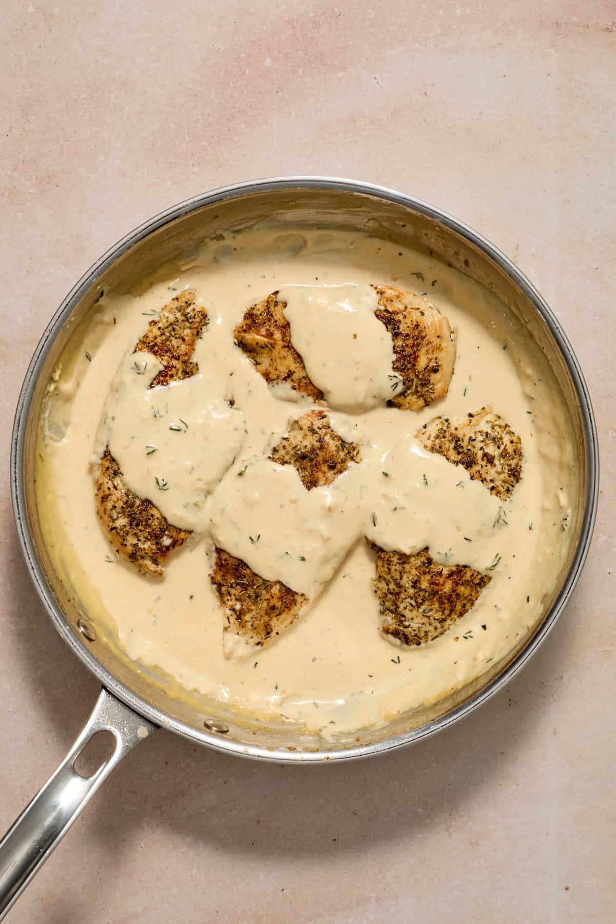 Pan with garlic parmesan cream sauce and chicken.