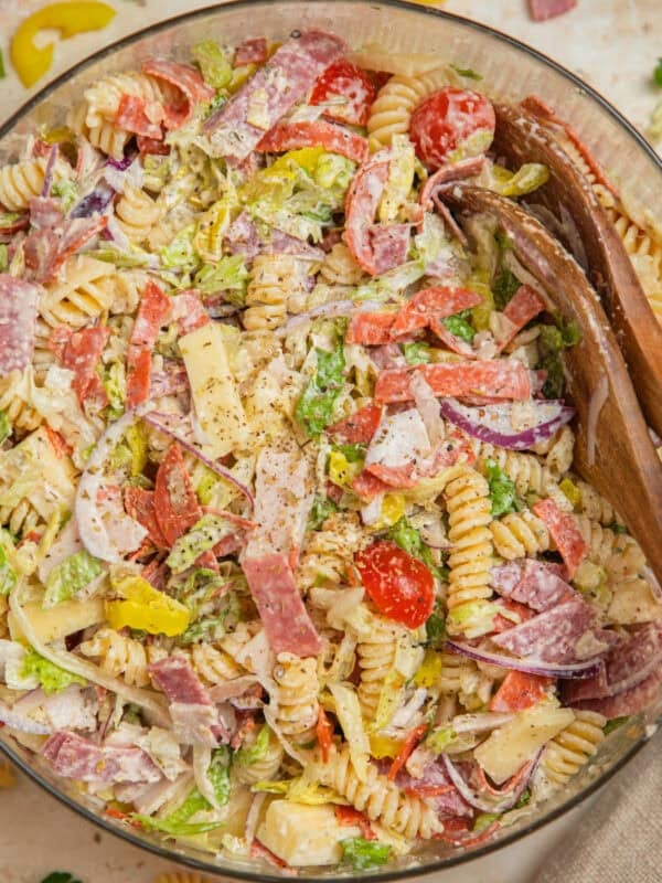 Italian grinder sub pasta salad in glass serving bowl.