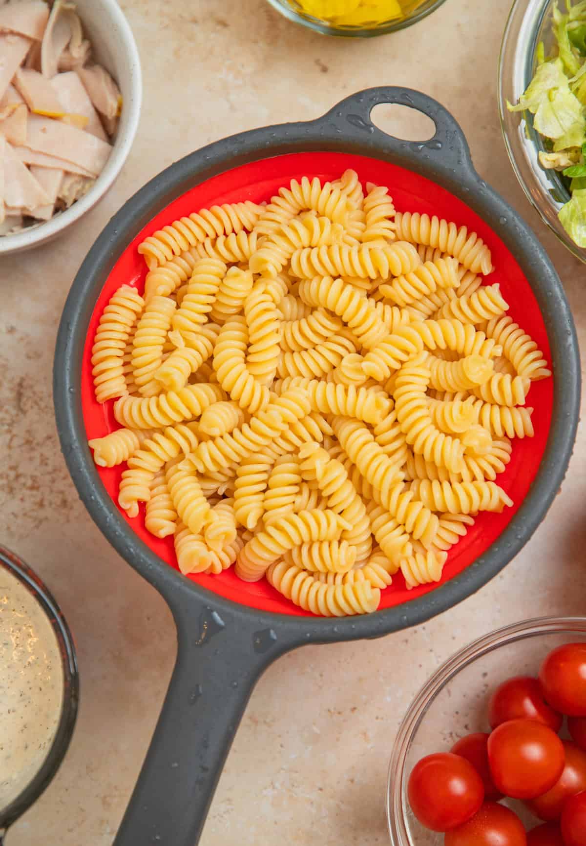 Pasta in strainer.