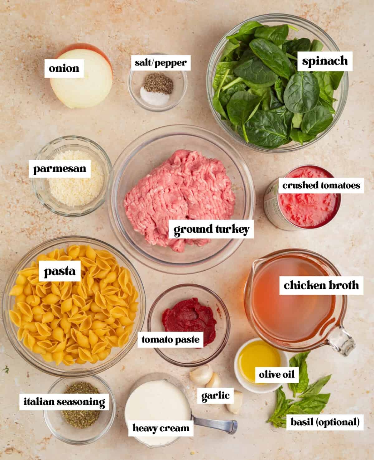 Pasta, spinach, can of crushed tomatoes and other labeled ingredients.