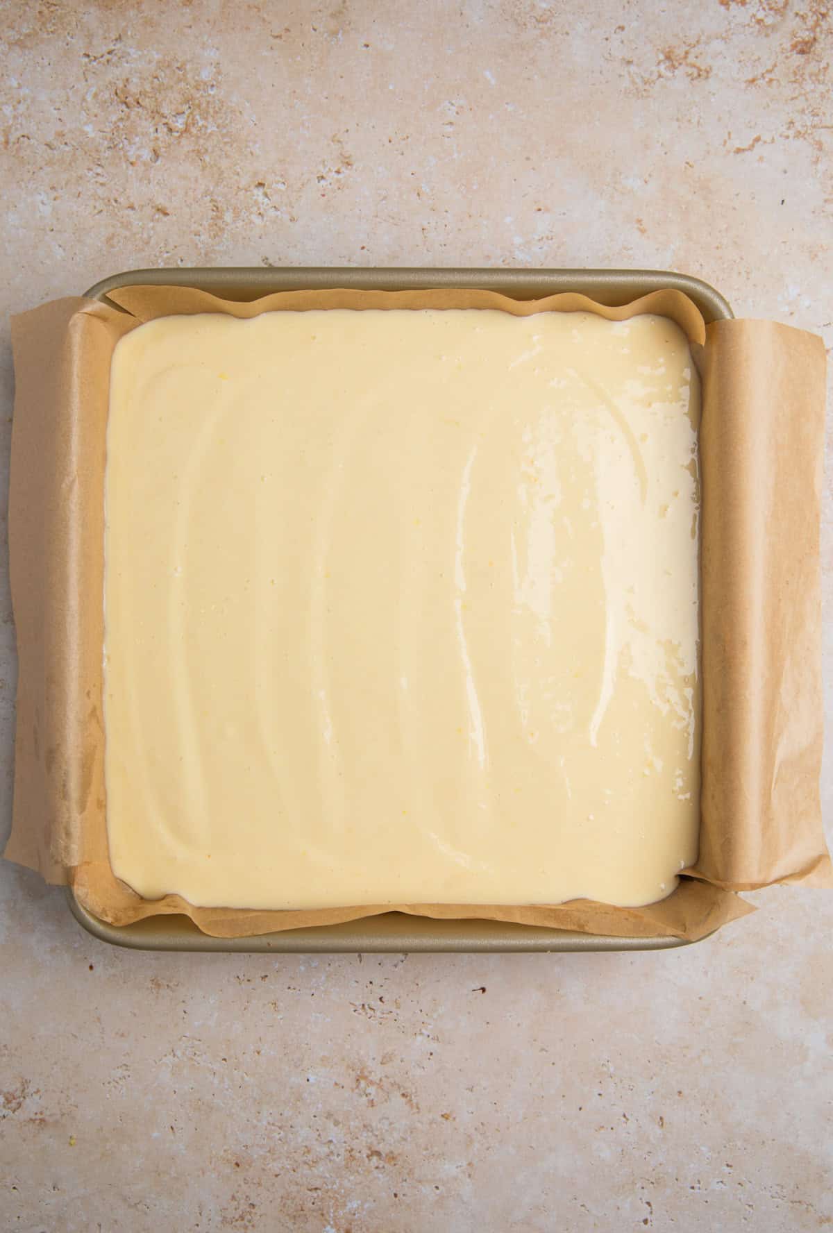 Lemon mixture in pan over crust before baking.