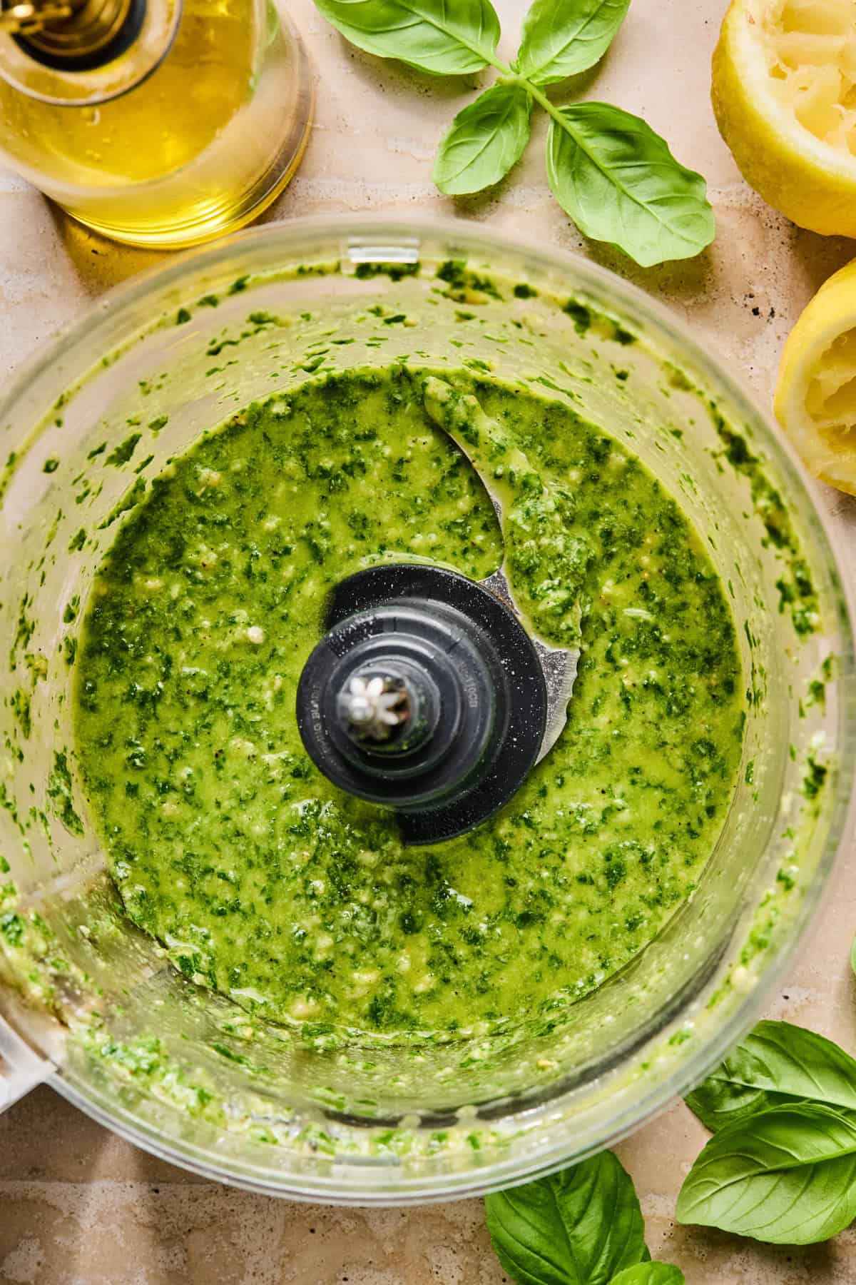 Food processor with basil pesto.