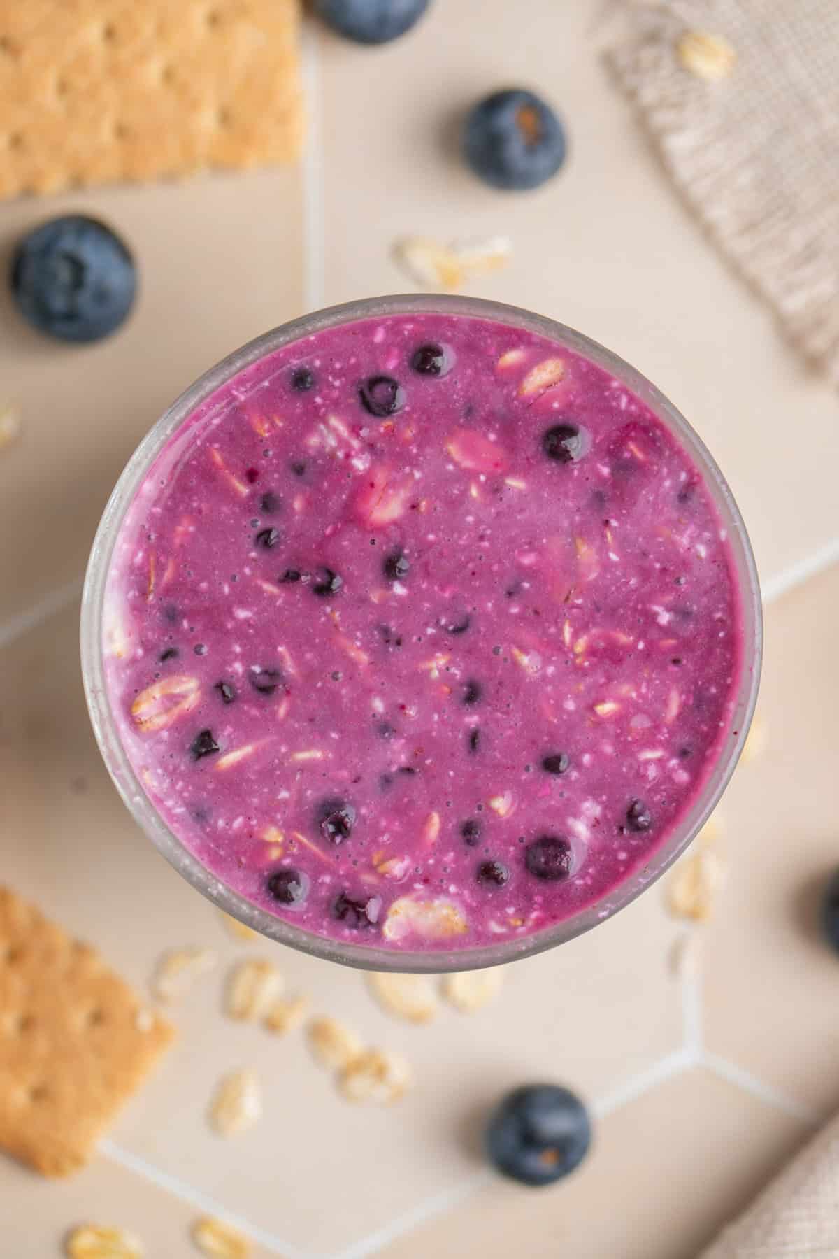 Blueberries mixed with overnight oats before chilling.