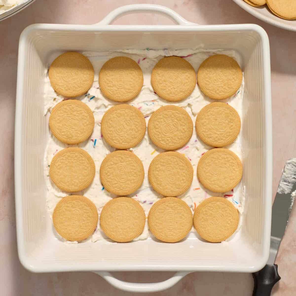 White baking pan with Golden Oreo thins arranged 4x4.