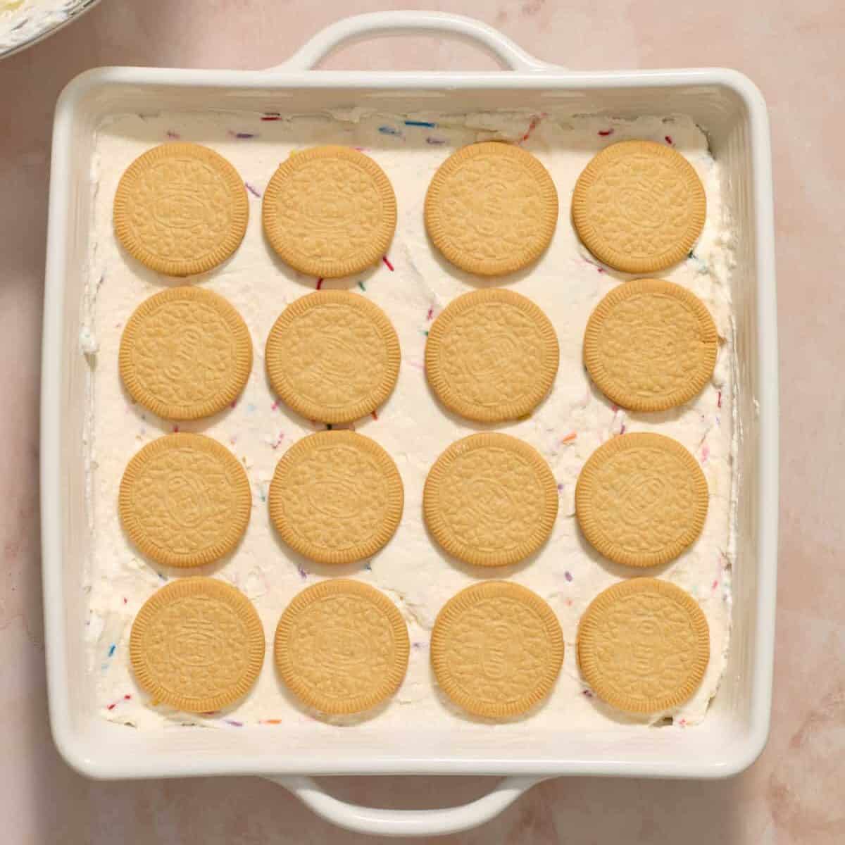 4 by 4 Golden Oreos arranged in pan.