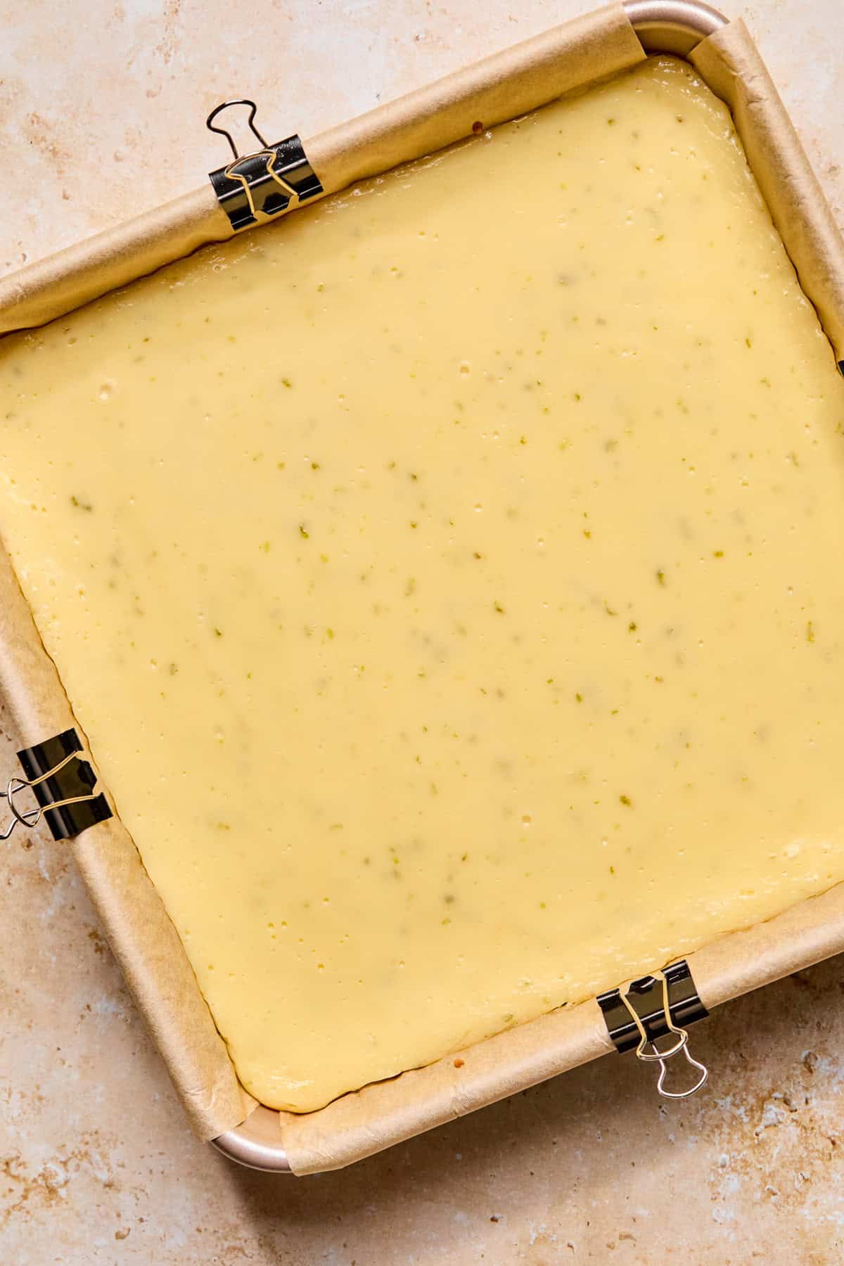 Baked creamy margarita bars in pan.