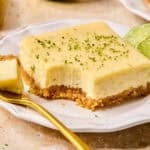 Creamy margarita bar on plate with forkful.