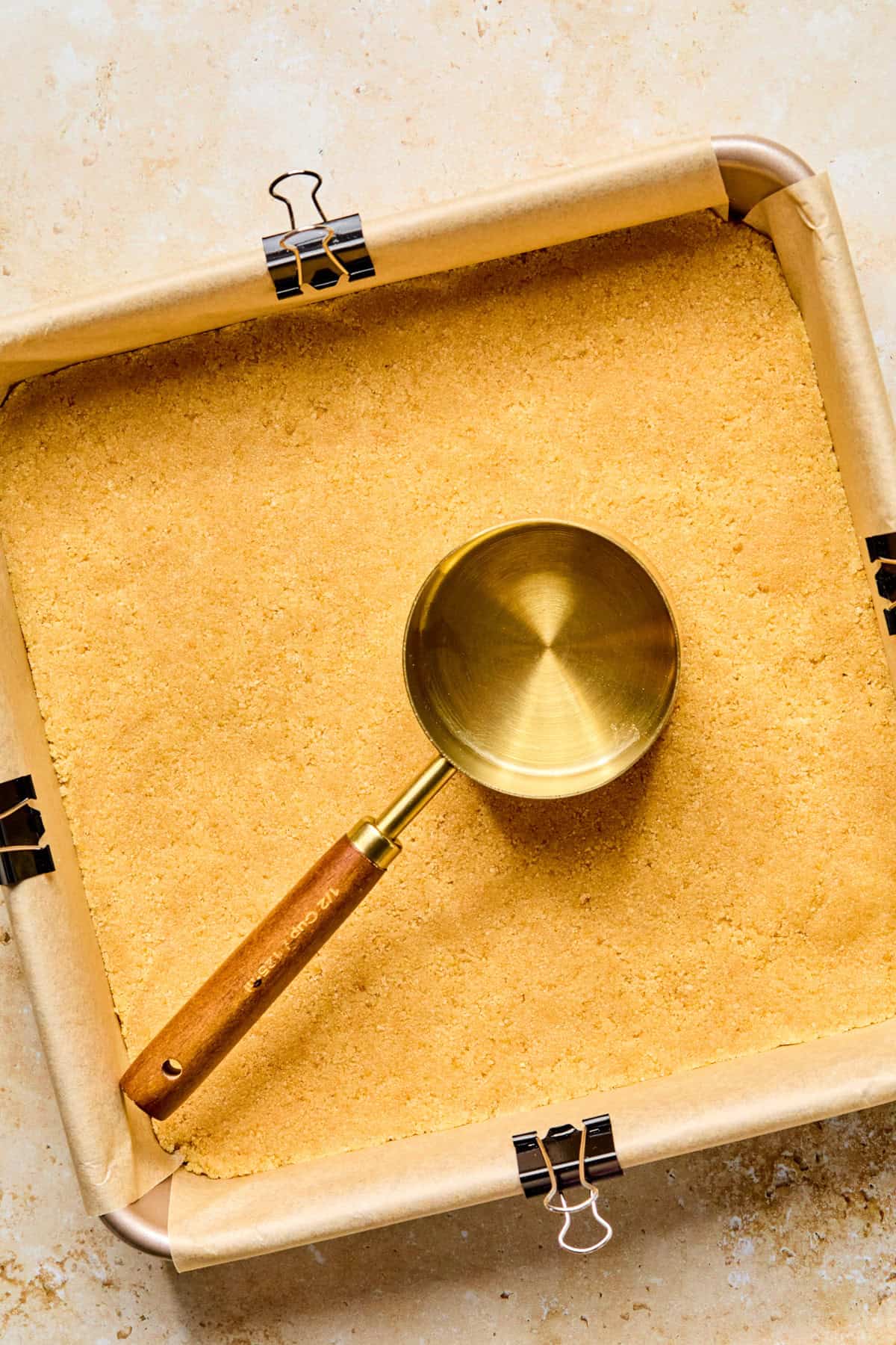 Ritz cracker mixture pressed into baking pan.