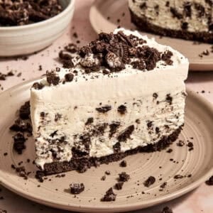 Slice of Oreo ice cream pie on plate.