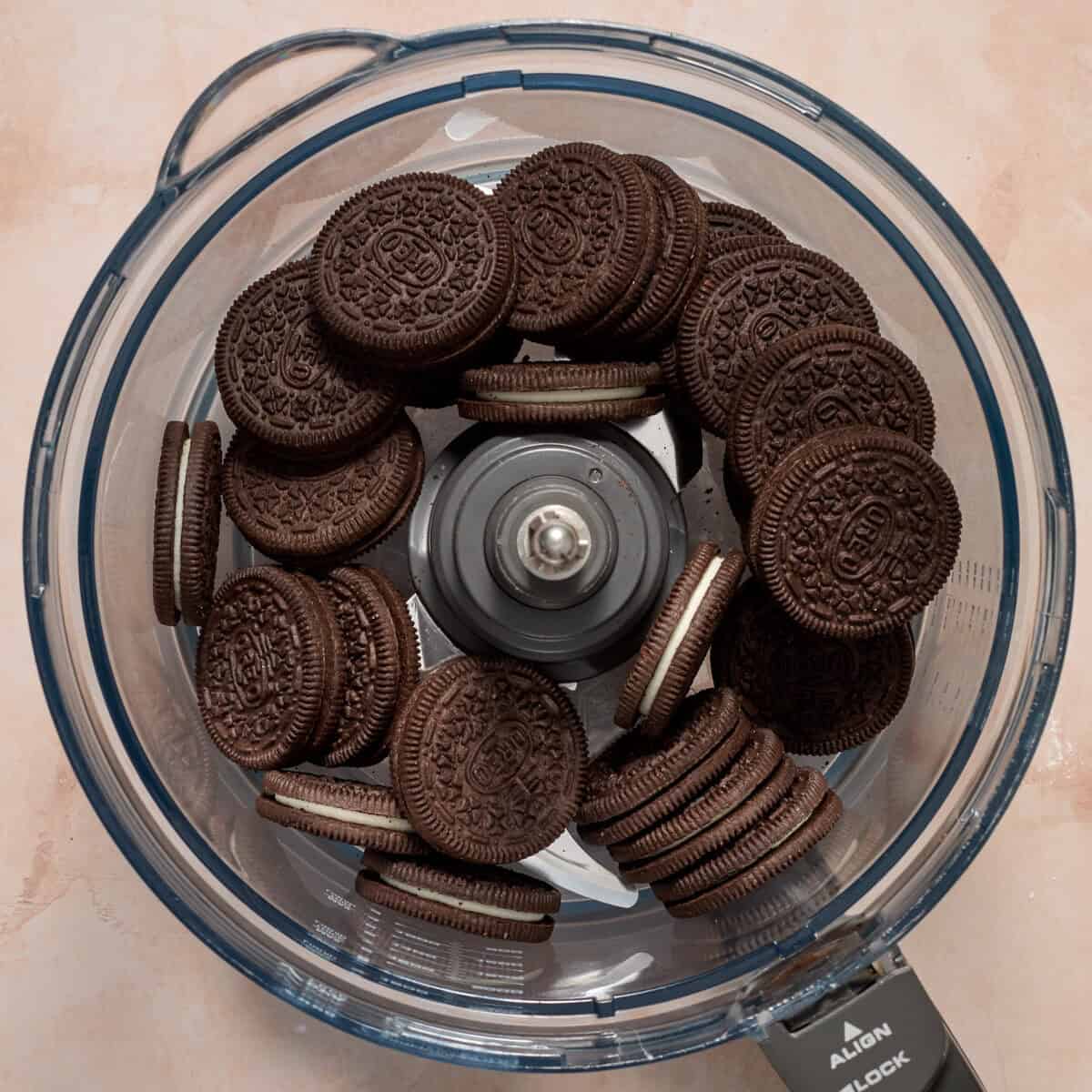 Oreo cookies in food processor before being crushed.