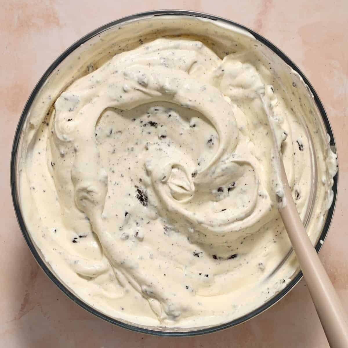 Oreos folded into no-churn ice cream mixture.