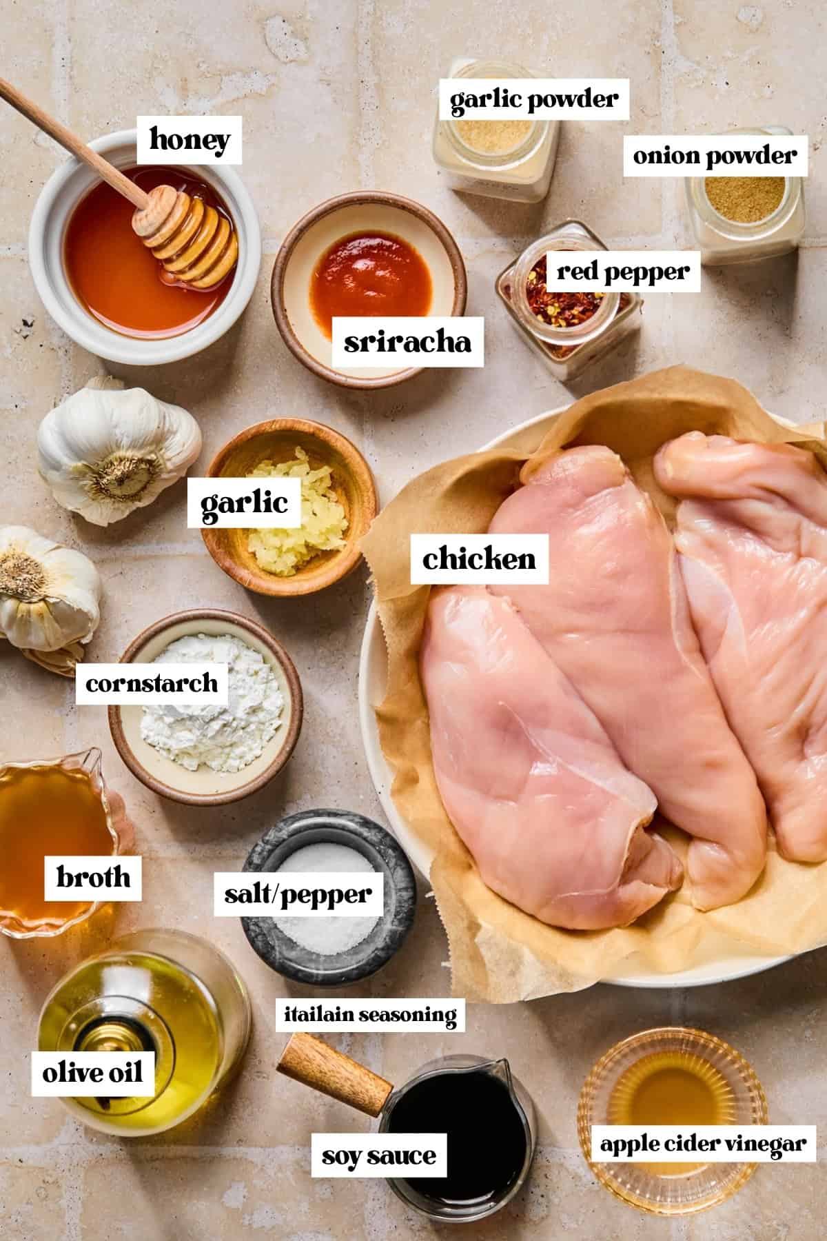 Chicken breast, honey, sriracha, soy sauce and other ingredients labeled for recipe.