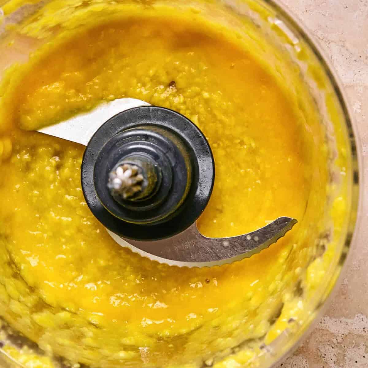 Mango puréed in food processor.