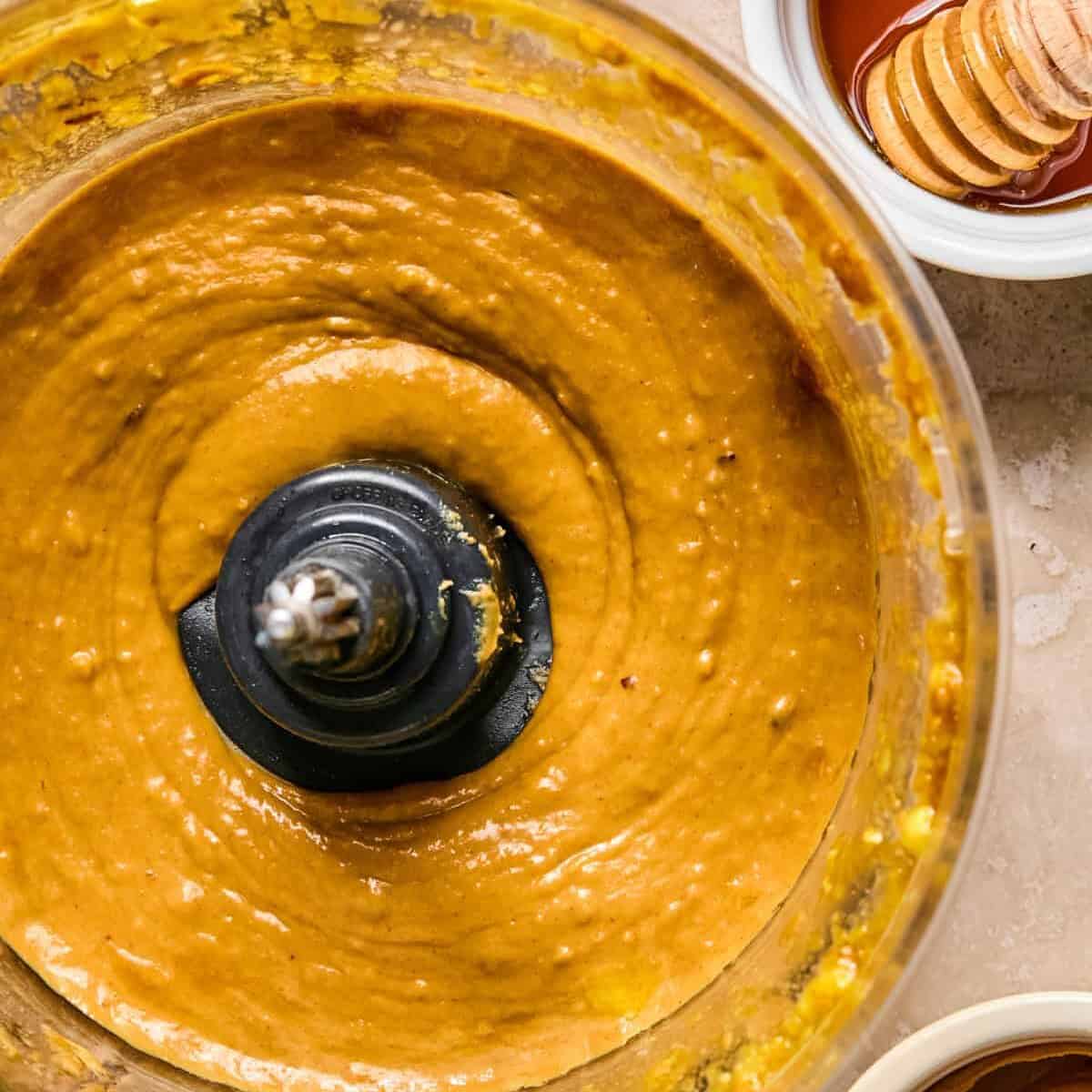Peanut mango sauce in food processor.
