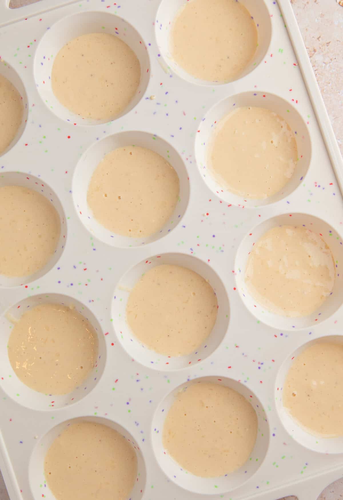 Pancake bite batter in silicone muffin pan.