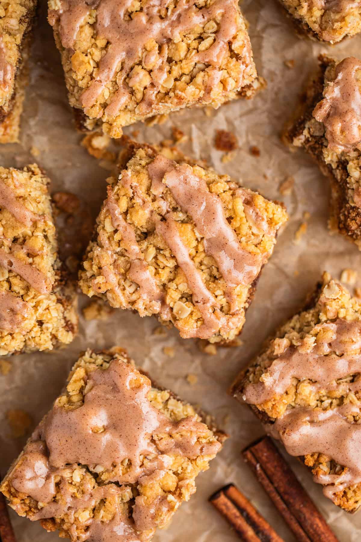 Brown sugar cinnamon oatmeal crumb bars with cinnamon drizzle.